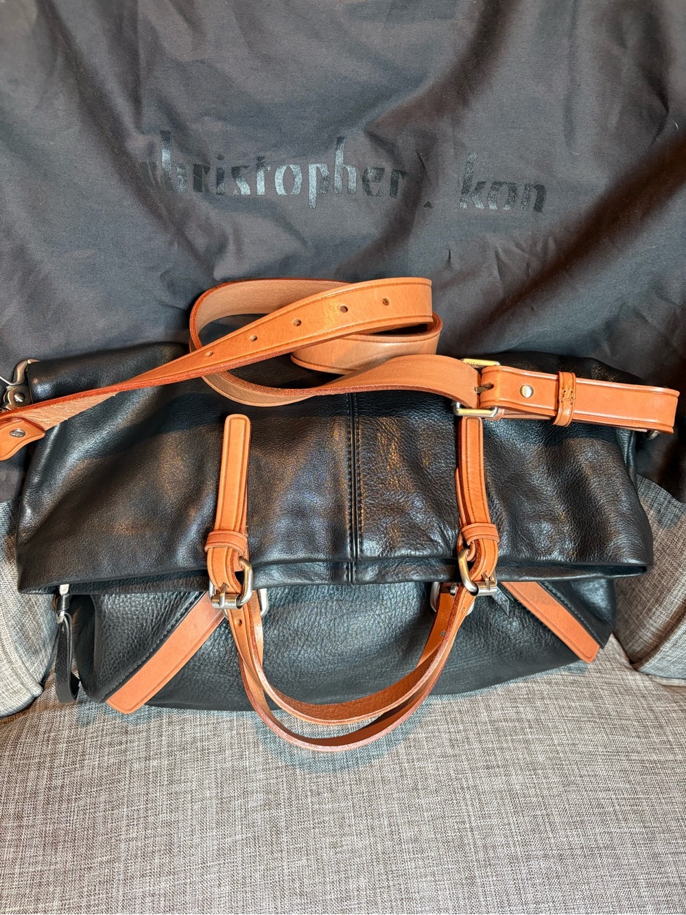 Christopher Kon Black Leather cross body purse with Caramel accents Like New